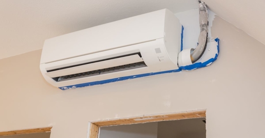 Ductless mini-split system hanging on the wall