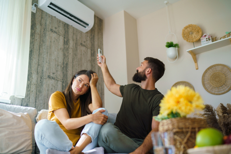 couple frustrated on their AC
